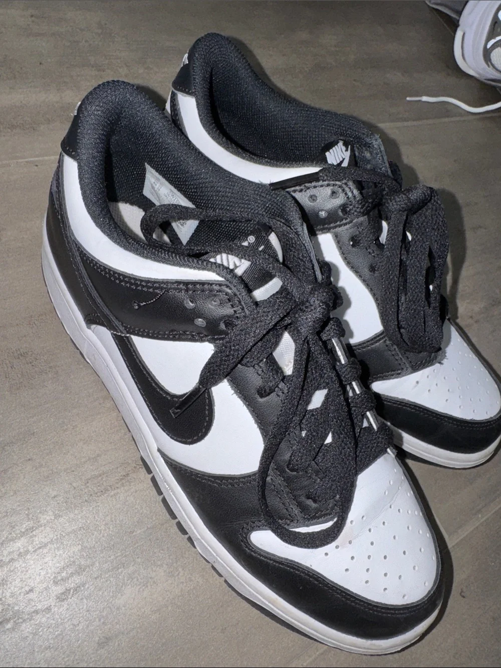 Nike women's Black and White dunk sneakers